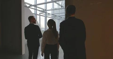 Estate Agent Showing Empty Office Space To Potential Clients Video stock 127158074