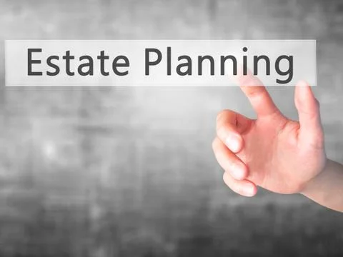 Estate Planning - Hand pressing a button on blurred background concept on vis 库存照片