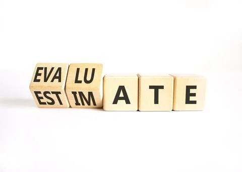 Estimate or evaluate symbol. Concept words Evaluate to Estimate on beautifu.. Stock Photos