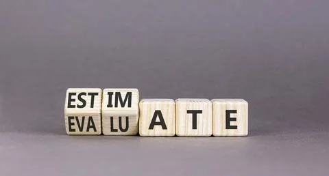 Estimate or evaluate symbol. Concept words Evaluate to Estimate on beautifu.. Stock Photos