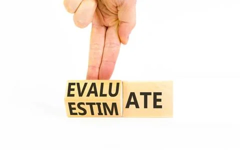 Estimate or evaluate symbol. Concept words Evaluate to Estimate on beautifu.. Stock Photos