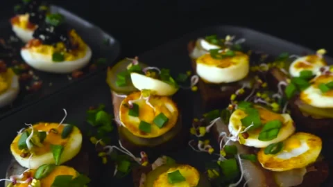 Estonian Independence Day Deviled Eggs and Sprat Sandwiches Stock Footage 331459582