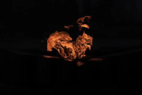 Eternal flame - in the dark Stock Photos