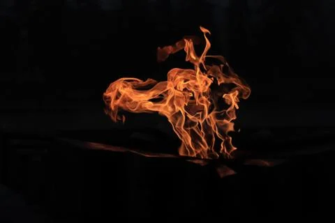 Eternal flame - in the dark Stock Photos