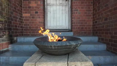 Eternal Flame of Democracy Lit by Nelson Mandela at Constitution Hill 4K Stock Footage 337621548