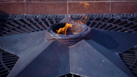 Eternal Flame. Fire burns in memory of millions fallen people in Russia. Stock Footage 110573246
