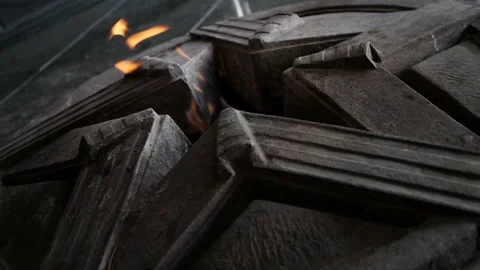 Eternal flame in memory of those killed in world war II Stock Footage 128875399