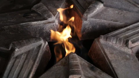 Eternal flame in memory of those killed in world war II Stock Footage 128878838