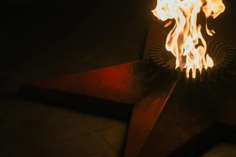 Eternal flame at the monument to the heroes of the second world war Stock Photos