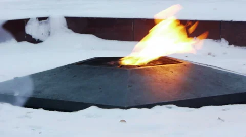 Eternal flame on the monument to unknown soldier Stock Footage 1034792