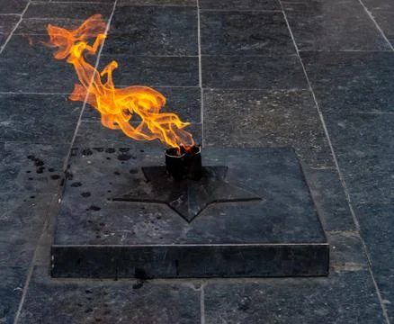 Eternal flame near the monument Stock Photos