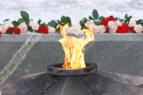 Eternal flame in the winter Stock Photos