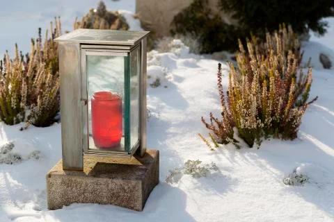 Eternal light at the grave Stock Photos