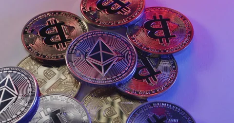 ETH on top of piled up Bitcoin, BTC coins. Exchanging digital crypto currency Stock-Footage 172056142