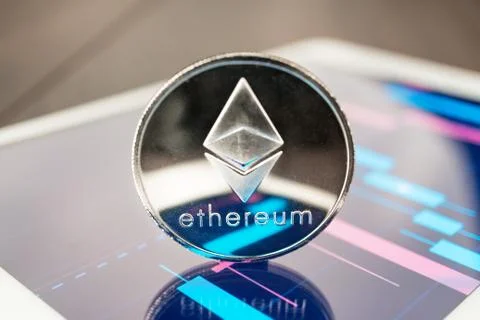 Ether cryptocurrency on the tablet Stock Photos