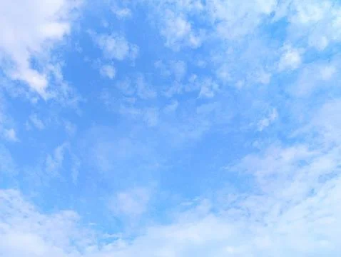 Ethereal Cirrus Clouds Dancing Across Vibrant Blue Summer Sky Stock Photos