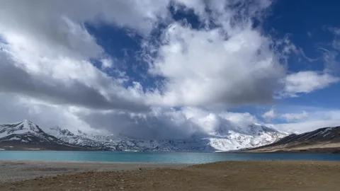 Ethereal Cloud Sea Flowing over Tibetan Snow Peaks and Lake Timelapse Stock-Footage 332381647