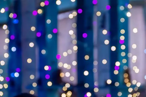 Ethereal light orbs between columns evoking themes of enchantment, memory, and Stock Photos