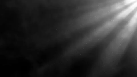 Ethereal light rays pierce through billowing smoke, dark, dusty atmosphere Stock Footage 341854701