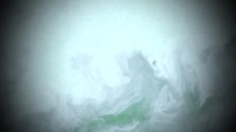 Ethereal swirling patterns in white, gray, and green create a calming, abstract Video stock 325249736