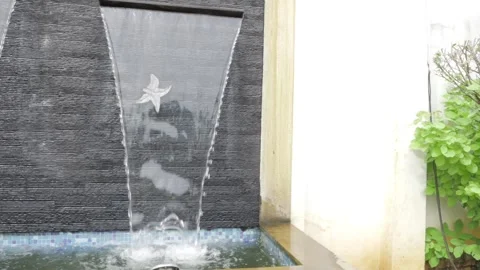Ethereal Waterfall Elegance - A Zen-Inspired Oasis Stock Footage 320913929