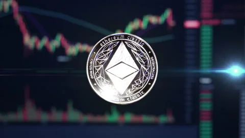 Ethereum Classic ETC crypto currency coin hovering in front of trading Stock Footage 160985830