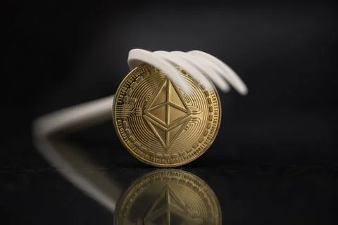 Ethereum Classic with Plastic Fork on top Stock Photos