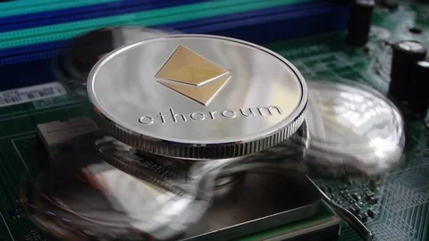 Ethereum Crypto Currency, rotating mirror surface, computer motherboard. Stock Footage 87871914