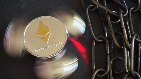 Ethereum Crypto Currency, rotating mirror surface, red laser and chain. Stock Footage 88085631