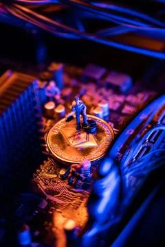 Ethereum Cryptocurrency coin on a PC computer motherboard, crypto currency mi Stock Photos