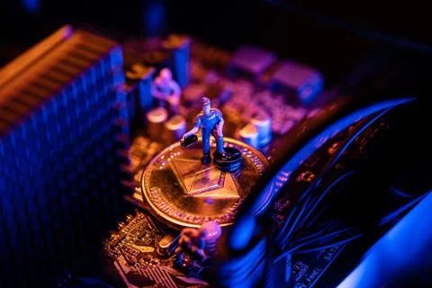 Ethereum Cryptocurrency coin on a PC computer motherboard, crypto currency mi Stock Photos