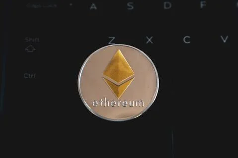 Ethereum Cryptocurrency Token Coin on Computer Keyboard Stock Photos