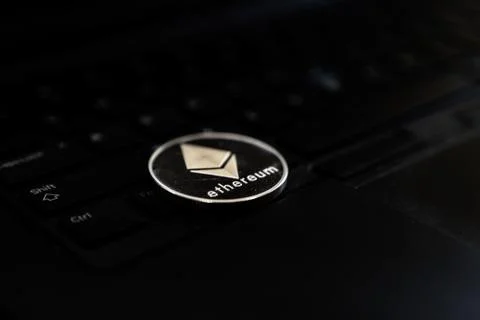 Ethereum Cryptocurrency Token Coin on Computer Keyboard Stock Photos