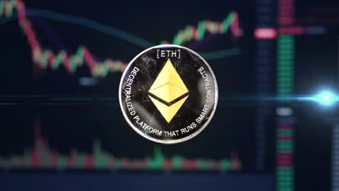 Ethereum ETH crypto currency coin hovering in front of trading charts with Stock Footage 160985739