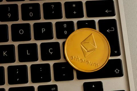 Ethereum on a laptop's keyboard Stock Photos