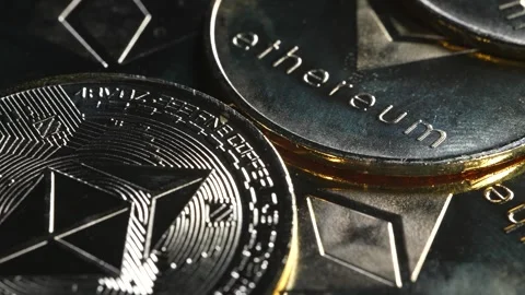 Etherium Coins spinning around in a macro shot 스톡 동영상 249925794