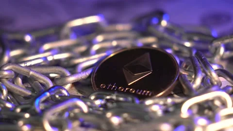 Etherium in the middle of silver chain in dantastic neon light with many Stock Footage 142503514