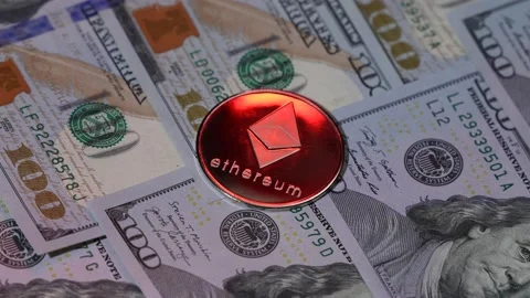 Etherium symbol coin rotating. Silver popular crypto coin. Motherboard is the Video stock 176829119