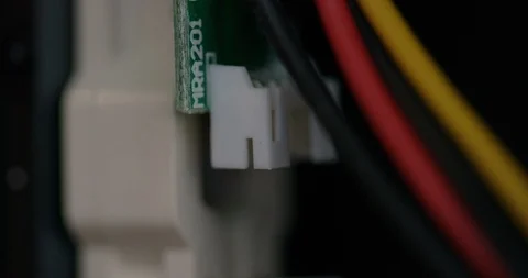 Ethernet cable coming up and plugging into socket, closeup Stock Footage 105438828