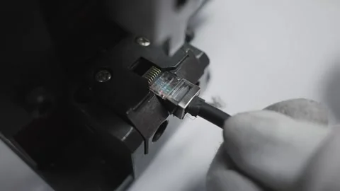 Ethernet cable connector assembling using cable production industrial tools Stock Footage 319503894