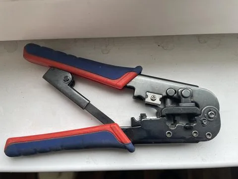 Ethernet cable crimping tool pair Stock Photos