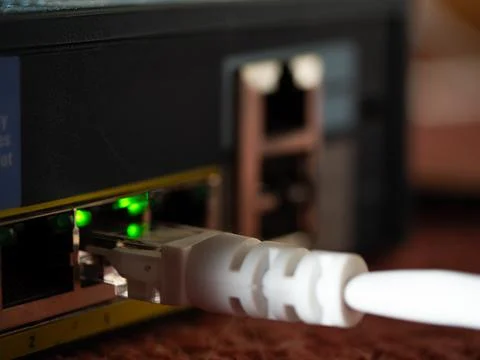 Ethernet cable in network switch port Stock Photos