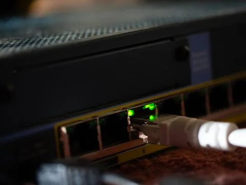 Ethernet cable in network switch port Stock Photos