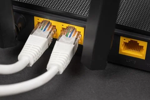 Ethernet cable with wireless router connect to internet service provider ne.. Stock Photos