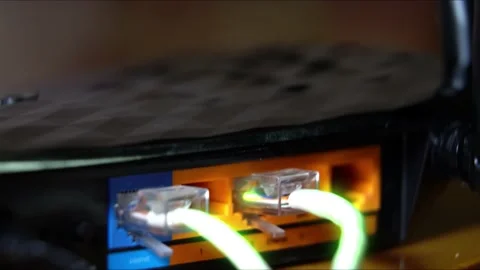Ethernet Cables, Connected To Modem, With Digital Binary Code ,Streaming Data Vidéo 166114907