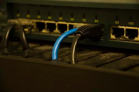 Ethernet cables connected to modem. Stock Photos