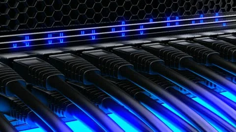 Ethernet cables plugged into a network switch with blue glowing light Stock-Footage 21383743
