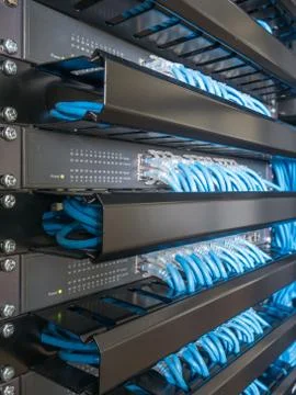 Ethernet network switch and network wire in rack cabinet Stock Photos