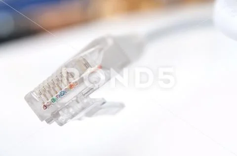 Ethernet RJ45 white Network Cable on white desk background ~ Hi Res ...