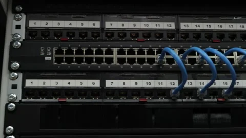 An Ethernet switch and patch panels. 库存影片 157676927